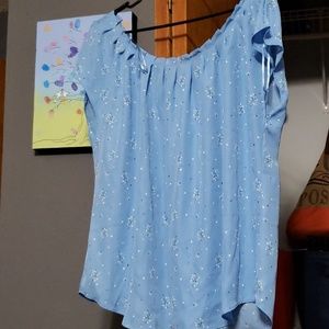 NWOT Baby blue blouse adorned with flowers